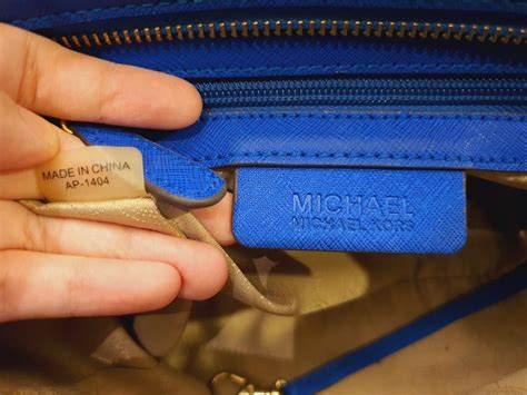 how can you tell if mk purse is real|michael kors purses serial number.